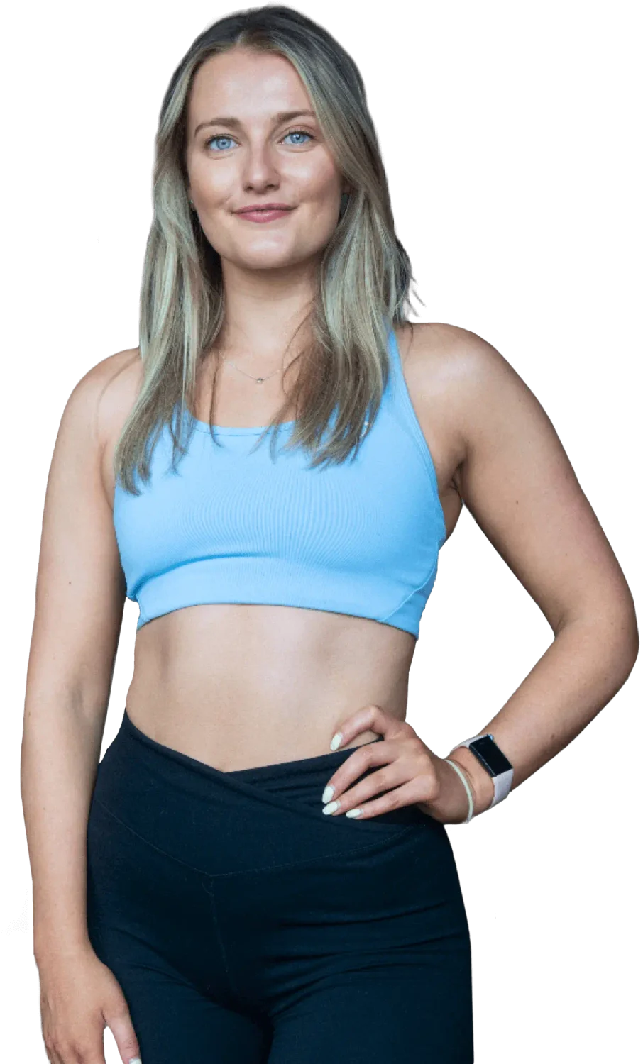 Photo of Sophie smiling in a light blue top and navy leggings.