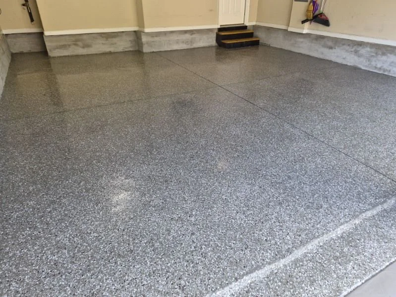 Glossy gray epoxy flake garage floor