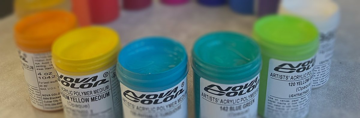 Different colored acrylic paint bottles from Nova Color 