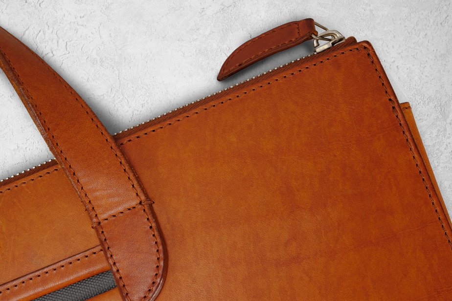 Cognac leather briefcase with pronounced patina development