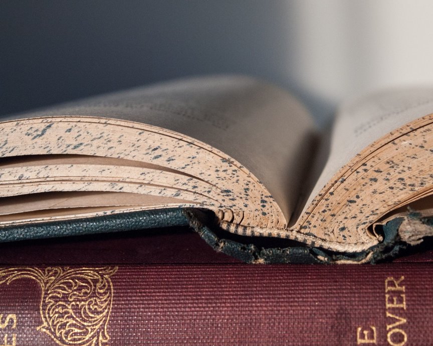 Open book showing bonded leather binding. 