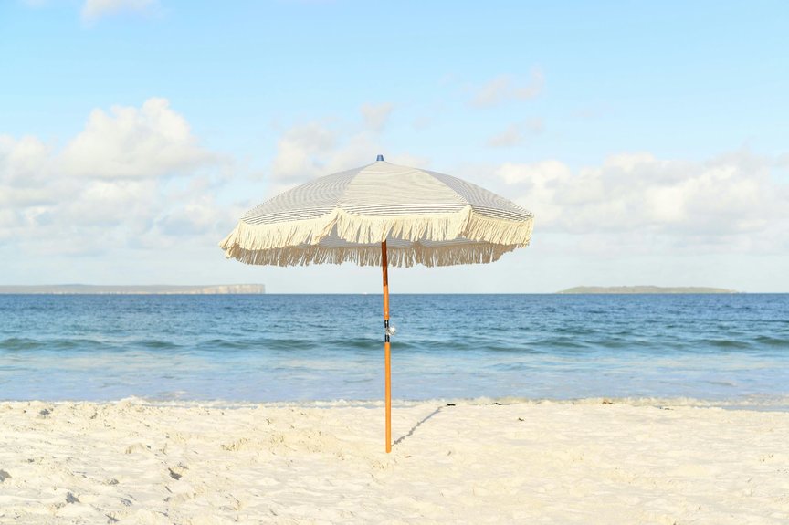 Picturesque beach scene with single beach umbrella
