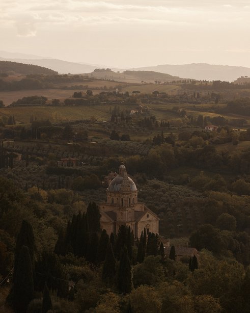 Lone church dotted amongst Tuscany's rolling hills