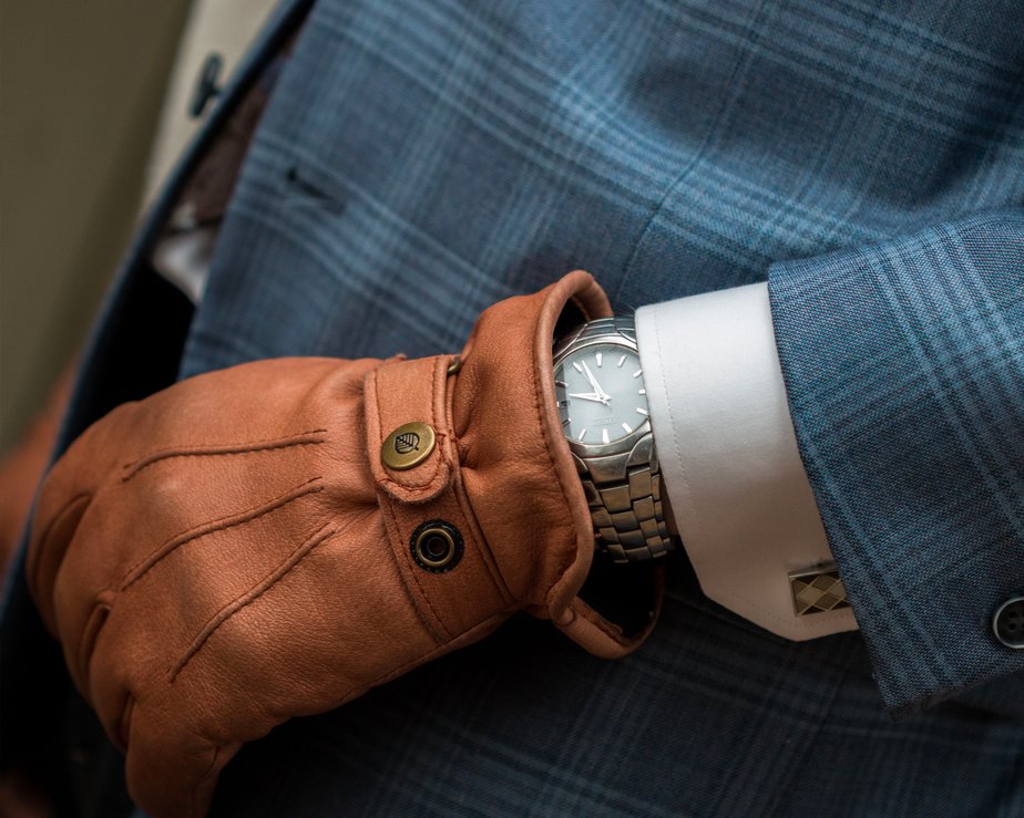 Brown deerskin leather gloves and silver watch 