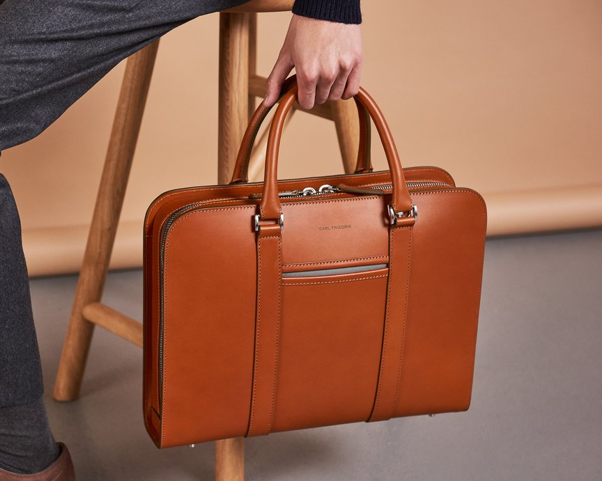Brown leather briefcase inspired by Scandinavian minimalism