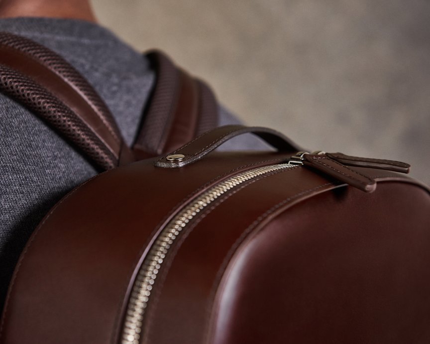 Upper section of a premium brown leather backpack by Carl Friedrik