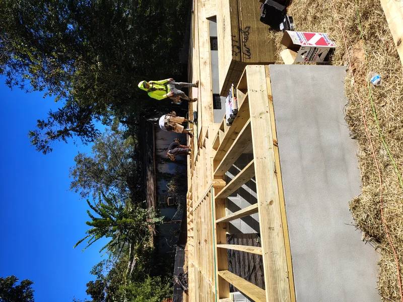 Deck framing with the crew on site