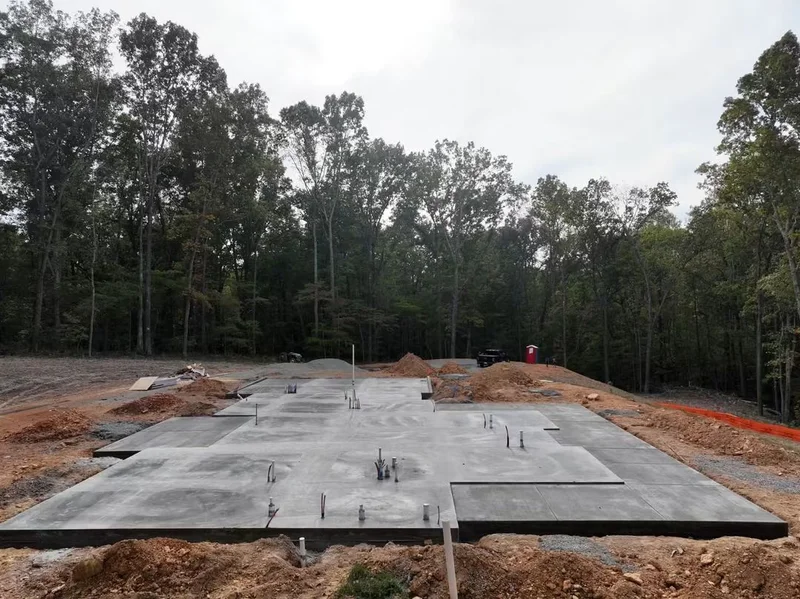 Concrete slab foundation with plumbing rough-ins