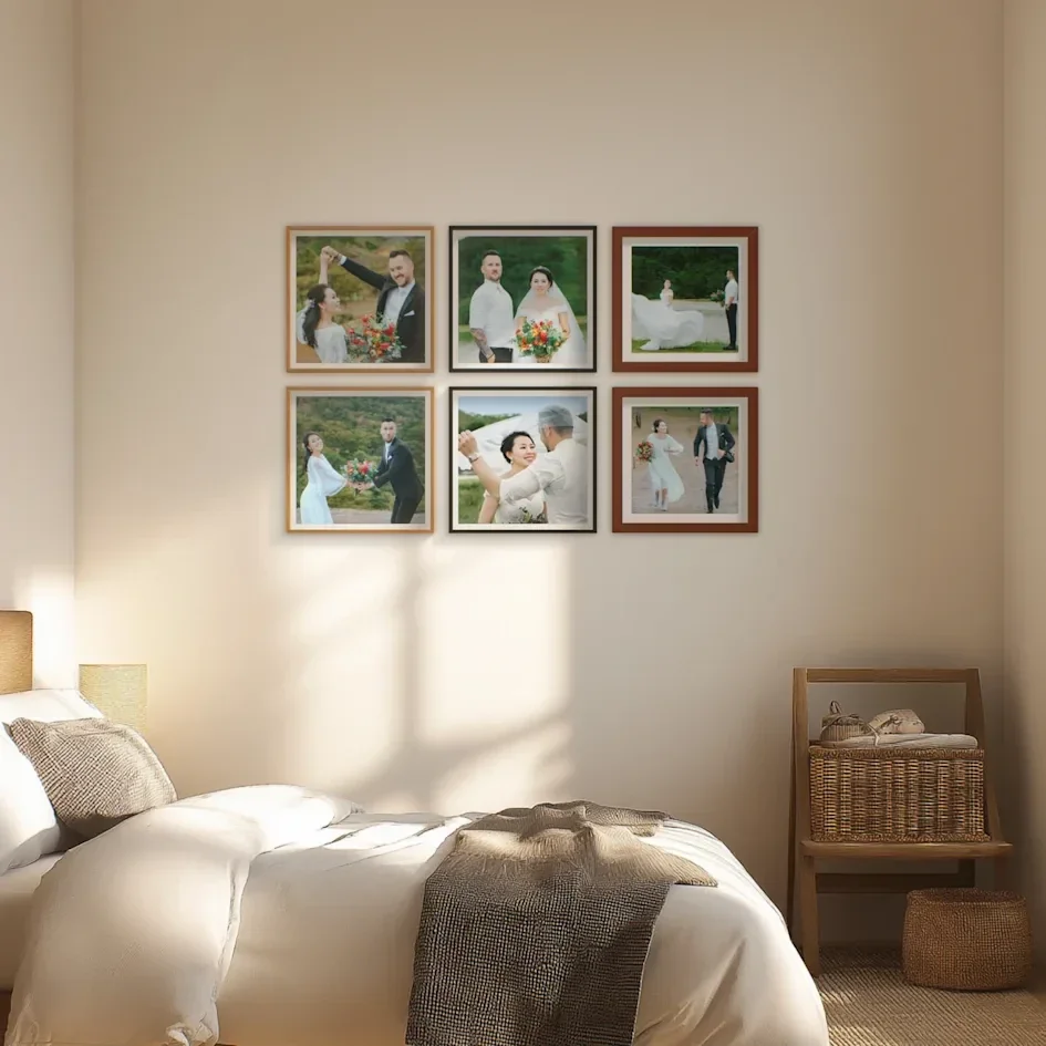 Six framed wedding photos above sunlit neutral bedroom