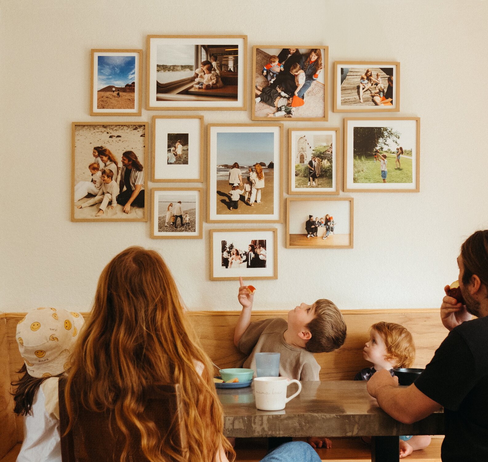 A cozy kitchen nook adorned with personal photos, making it a special space for daily moments and memories.