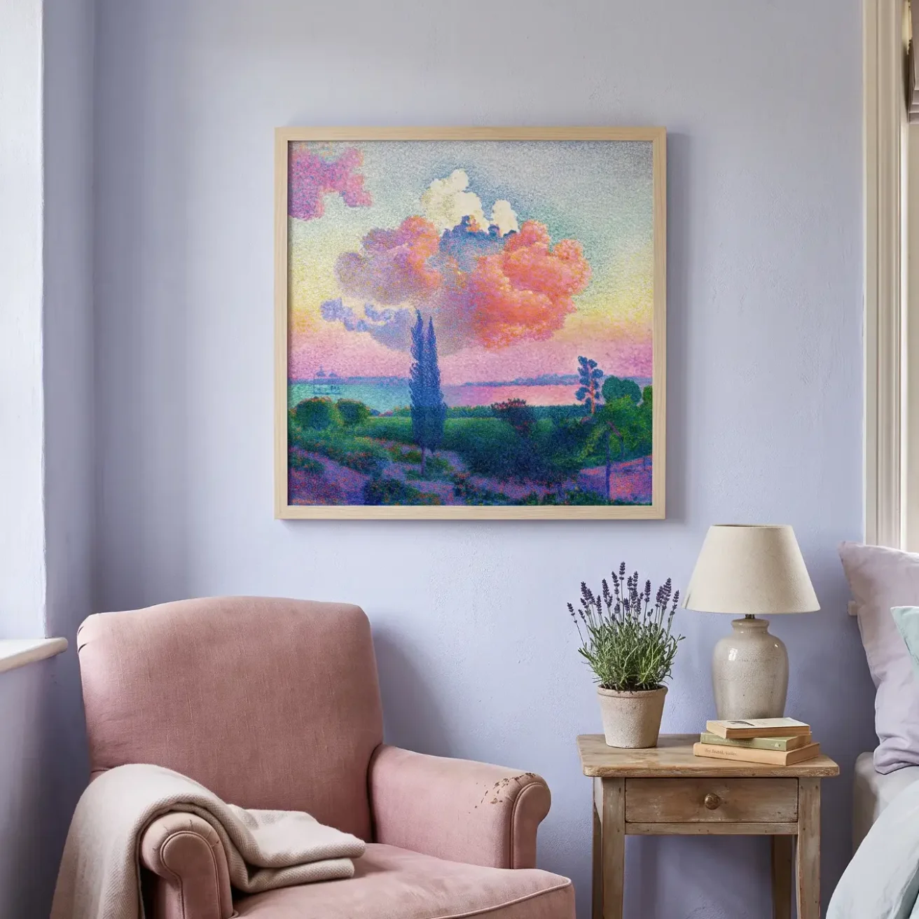 Pink Cloud painting framed in a cozy reading nook