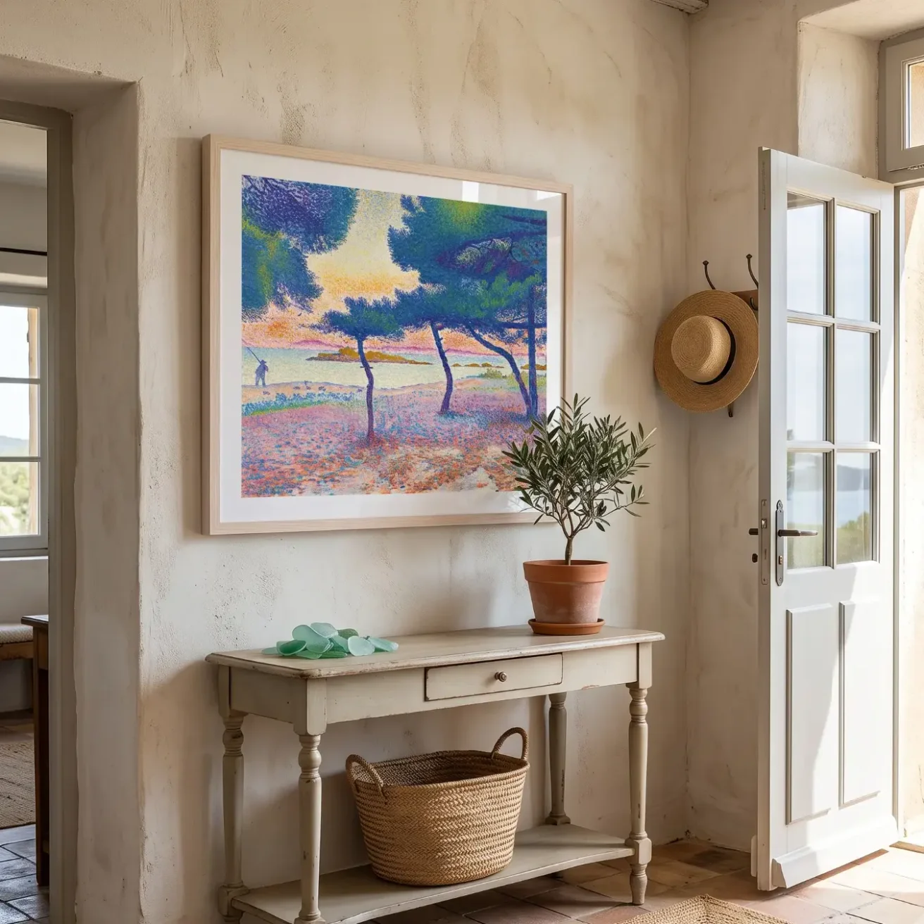 Cross coastal painting framed in a sunny entryway