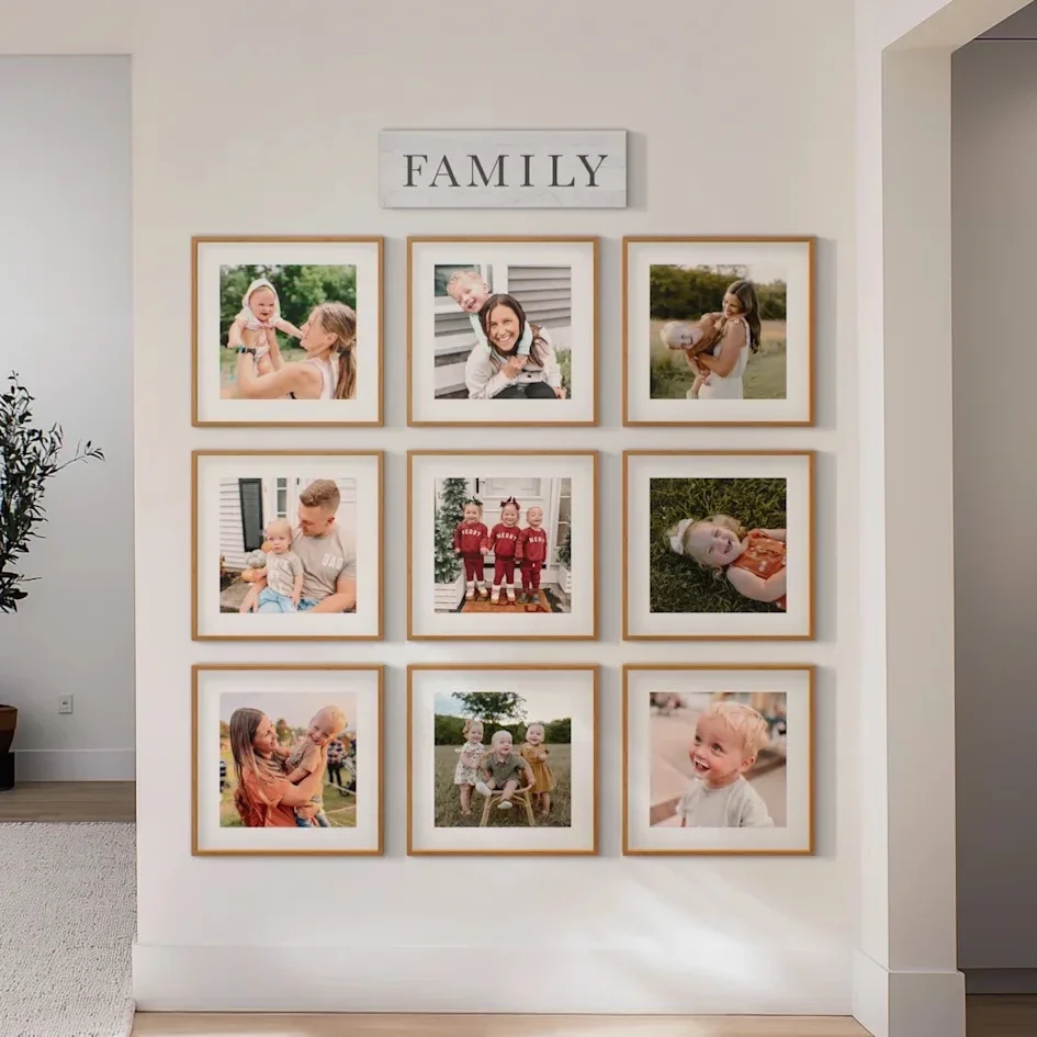 Family photo gallery wall with nine frames