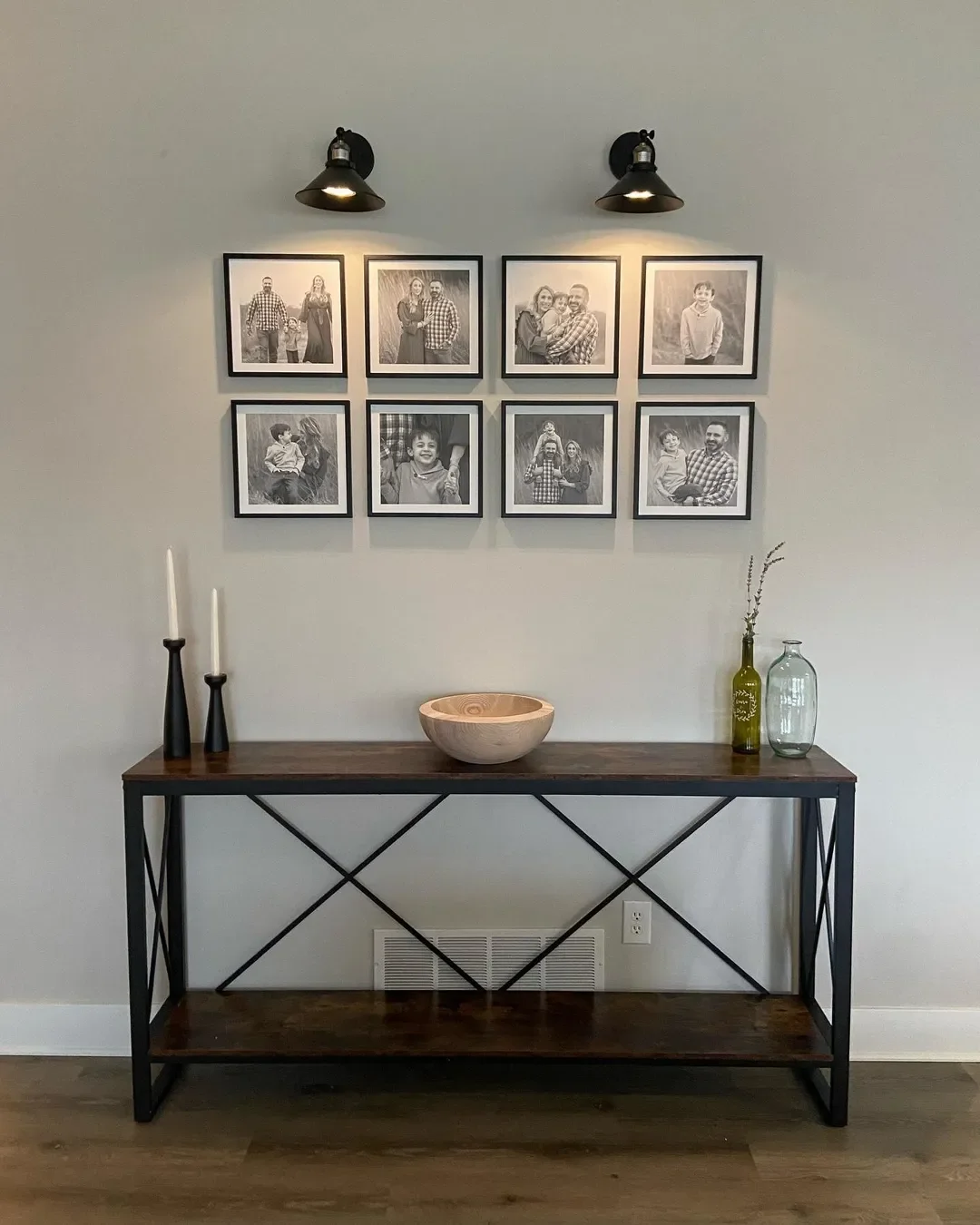 Maximalist hallway design with Mixtiles' framed photo tiles and adjusted light.