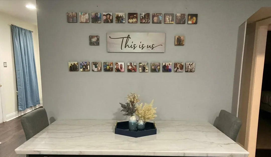 Dining room table with quoted plaque and photo tiles