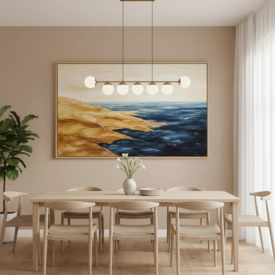 modern dining room with coastal art over table