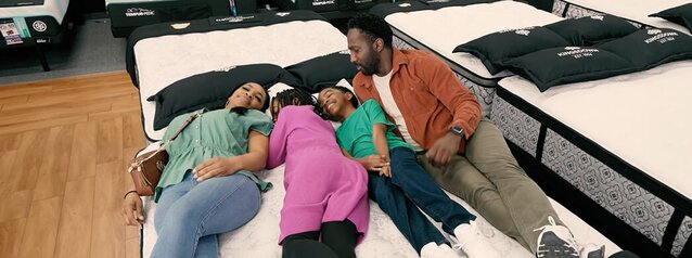 family on mattress