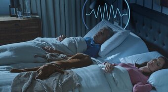 couple in bed - man snoring