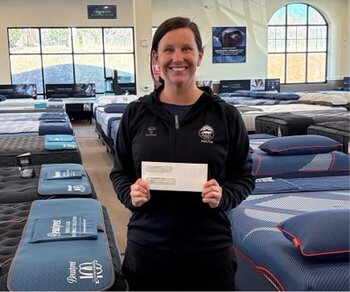 Woman with fundraising check