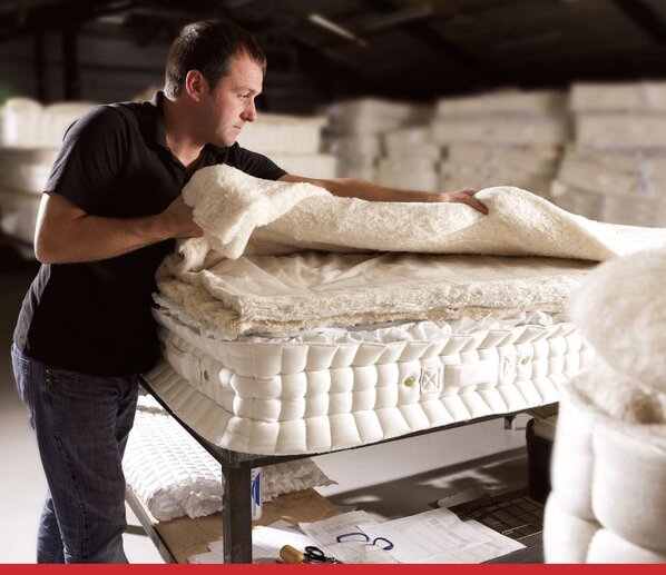 man assembling a mattress