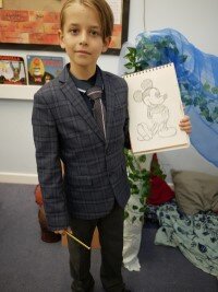 Boy dressed as Walt Disney