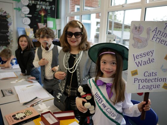 children dressed as Coco Chanel and Emmeline Pankhurst