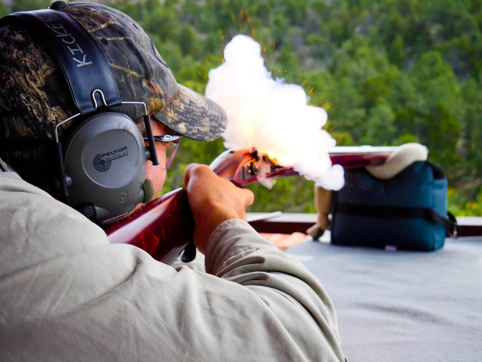 a flintlock shooter on a shooting bench