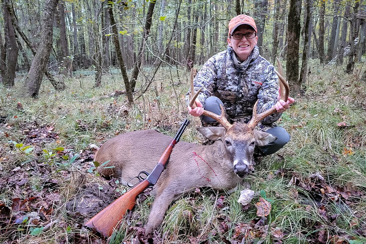 Alice Jones Webb posing with her buck