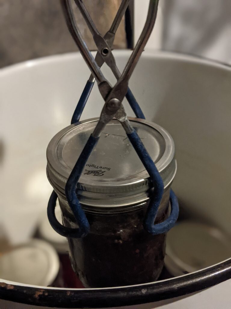 placing a jar in the water bath