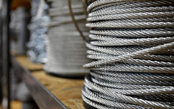 New galvanized steel cable rope on the shelf.