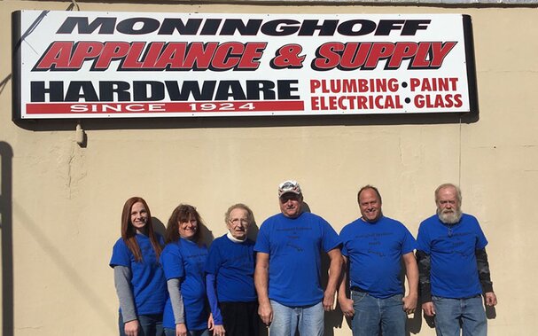 A team photo taken outside of Moninghoff Appliances & Supply.
