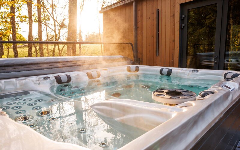 A large hot tub opened up during sunset.