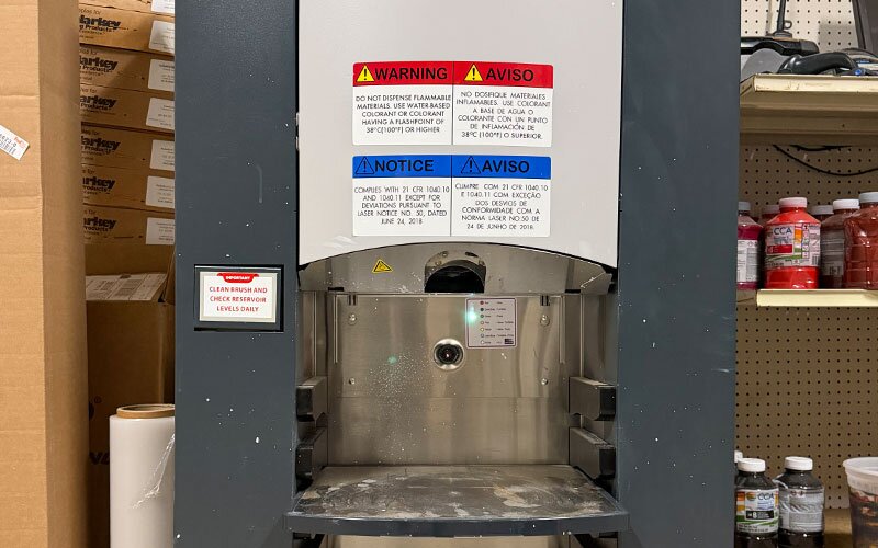 A paint mixer machine at Johnson Wholesale Lumber.