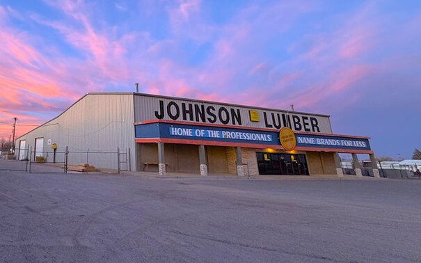 Exterior front of Johnson Lumber at sunset.