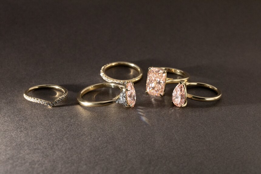 pink diamond engagement rings and wedding bands in yellow gold