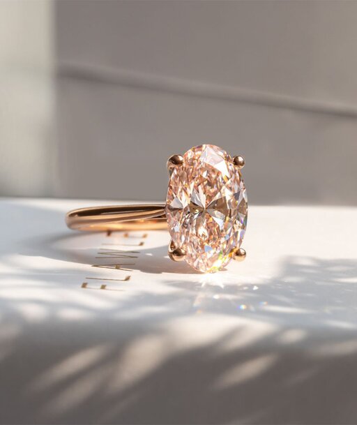 pink oval diamond solitaire engagement ring 
