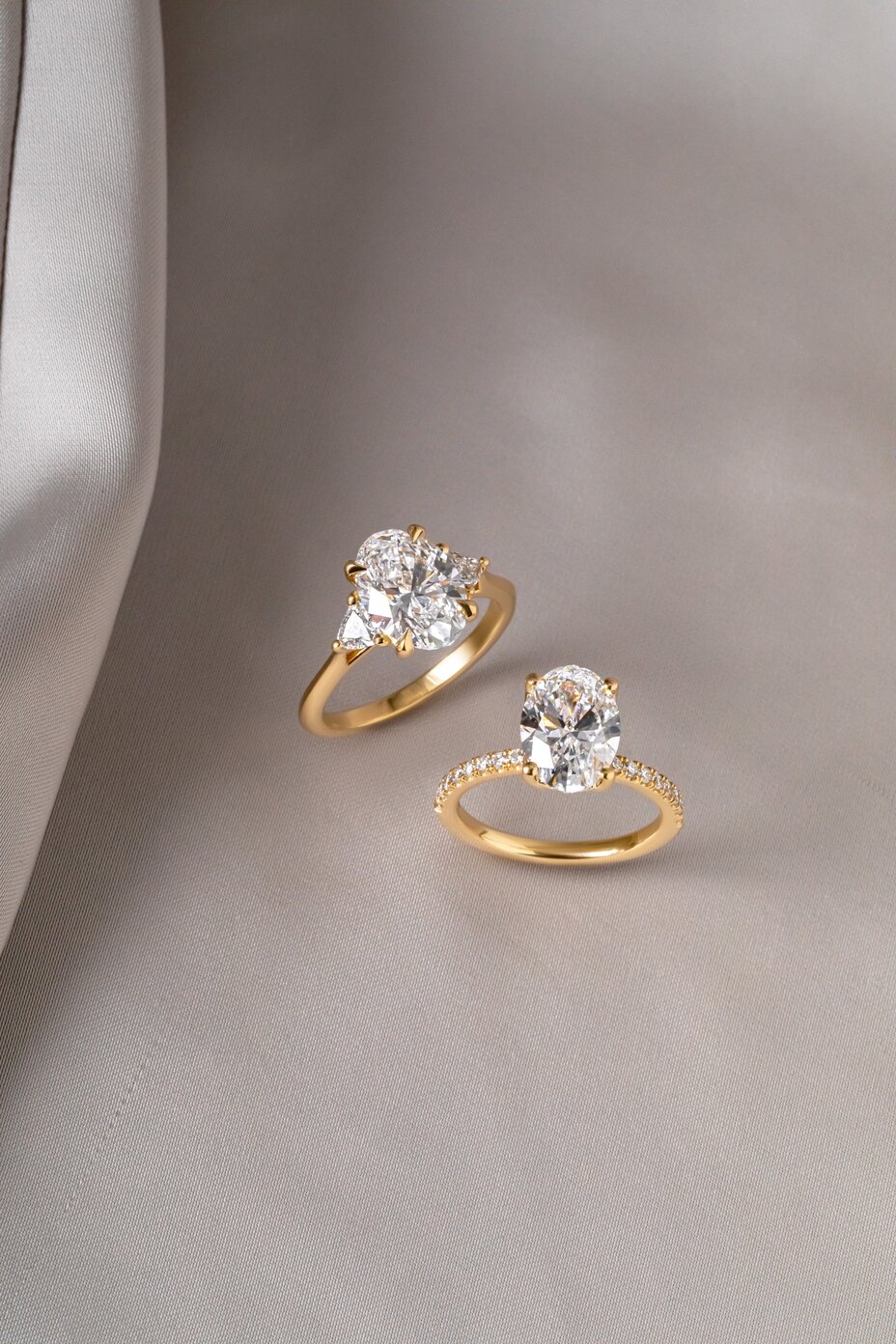 oval cut diamond rings and wedding band in yellow gold