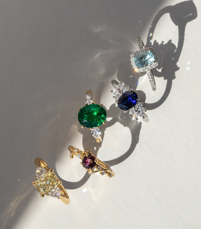 Coloured gemstone and diamond rings featuring emerald, sapphire, aquamarine and ruby designs