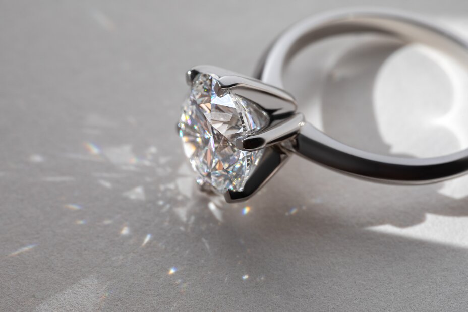 Classic solitaire diamond ring featuring a brilliant round-cut diamond in a six-prong setting