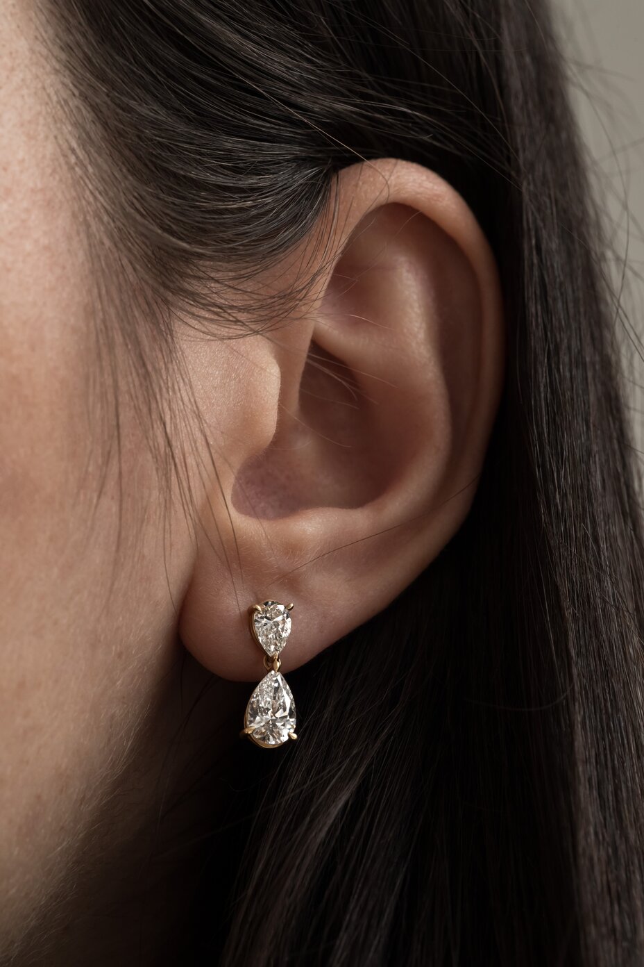 pear diamond drop earrings in yellow gold