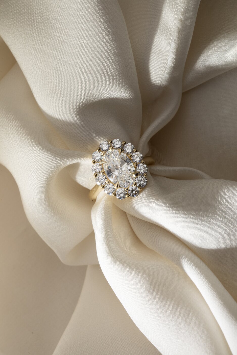 cluster halo oval engagement ring in yellow gold Marisol