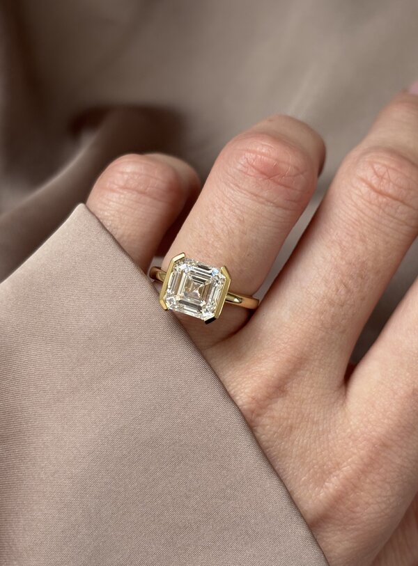 asscher diamond bezel engagement ring in yellow gold Avian