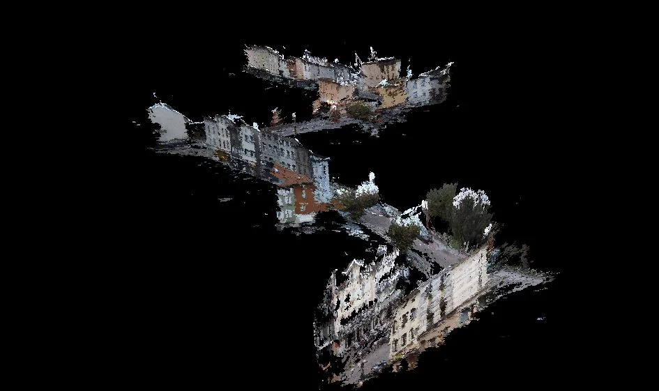 Aerial view of a property reconstructed as a 3D point cloud by imajing