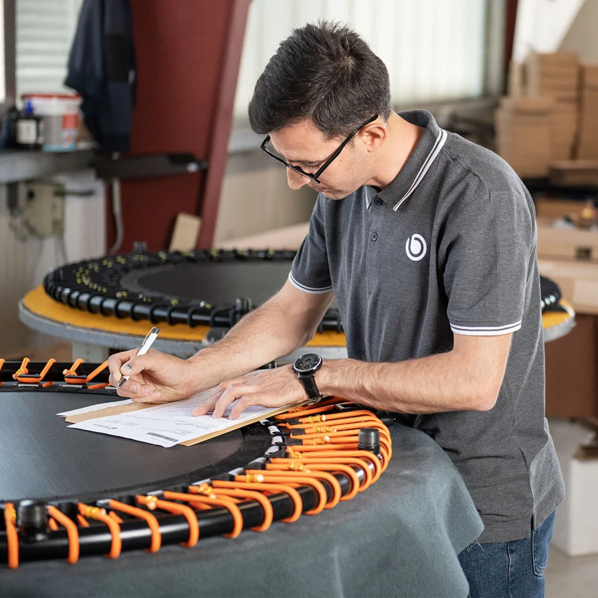A bellicon team member inspects the refurbished models.