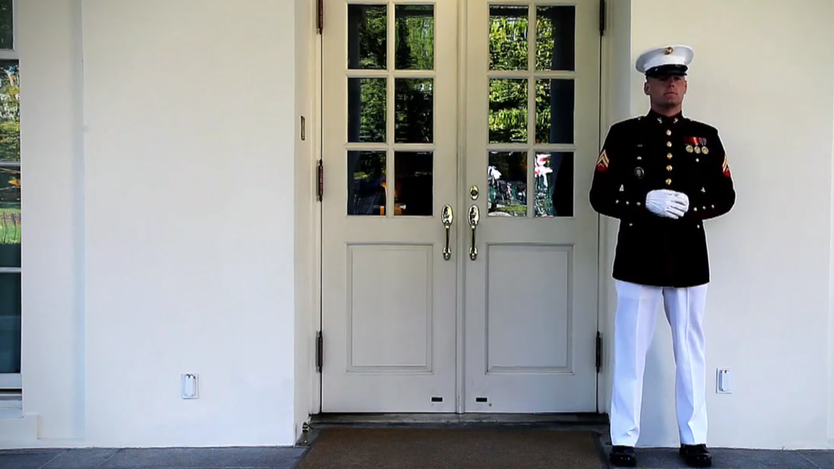 Watch This Marine Hardly Move at All as Lightning Hits the White House
