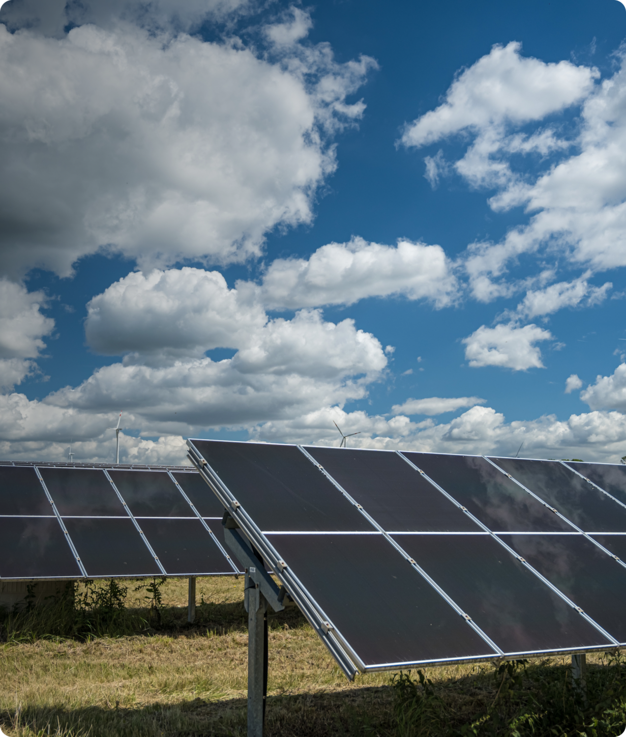 A solar energy project of a business built on the ground with a blue sky
