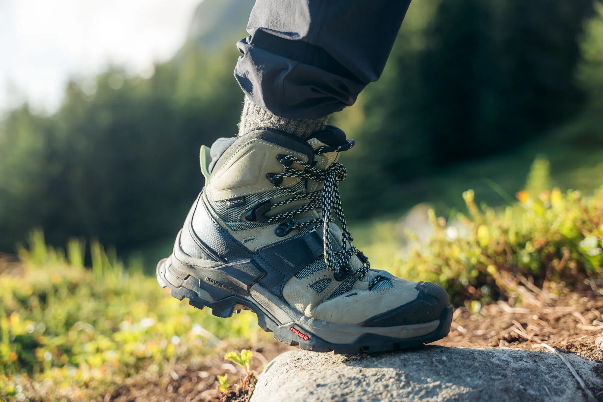old hiking boots with red laces
