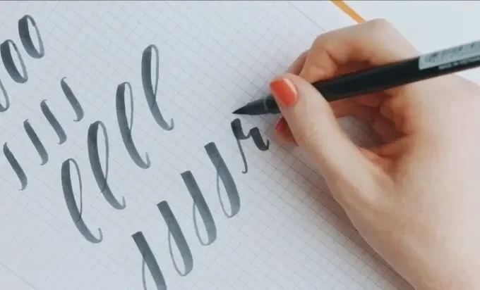 Image of a calligraphy tutorial showing tools, techniques, and examples ...