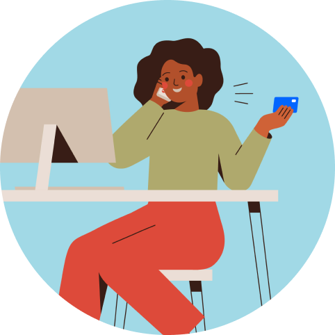 Illustration of a woman with dark hair wearing a green shirt and red pants sitting in front of the computer smiling and talking on the phone holding the Employer ID Number for her new LLC.
