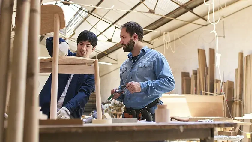 men in woodworking shop